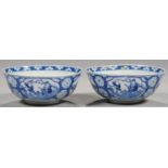 TWO MATCHING CHINESE BLUE AND WHITE BOWLS, QING DYNASTY, KANGXI MARK, 18TH C with prunus and cracked