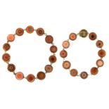 A VICTORIAN GOLD AND HARDSTONE NECKLACE, C1850 of stained agate half-beads, in plain collet