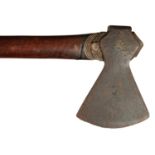 A MAORI BATTLE AXE OR LONG HANDLED HATCHET, TOKI KAKAUROA, C1860-1900 carved with a 'Janus' head and