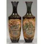 A PAIR OF DOULTON WARE VASES, C1900 decorated by Florence E Barlow in pate-sur-pate with birds on