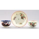 A LIVERPOOL POLYCHROME TEA BOWL AND SAUCER, PHILIP CHRISTIAN, C1770-75  painted with flowers, saucer