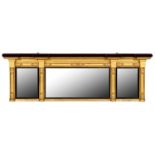 A VICTORIAN GILTWOOD AND COMPOSITION OVERMANTEL MIRROR, MID 19TH C  the three plates in reeded