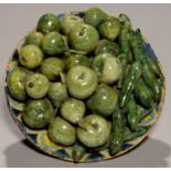 AN ITALIAN MAIOLICA TROMPE L'OEIL DISH OF FRUIT, 19TH C  the underside painted in blue, ochre and