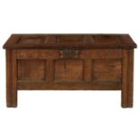 AN OAK CHEST, 18TH C   of panelled construction, the frieze carved with strapwork, 56cm h; 48 x