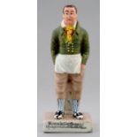 A STAFFORDSHIRE PEARL GLAZED EARTHENWARE THEATRICAL FIGURE OF JOHN LISTON AS SAM SWIPES IN "EXCHANGE