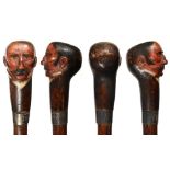 PRIZE FIGHTING.  AN EXTRAORDINARY VICTORIAN CARVED AND POLYCHROME PAINTED WOOD WALKING CANE,
