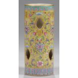 A CHINESE YELLOW GROUND FAMILLE ROSE CYLINDRICAL HAT STAND, QING DYNASTY, DAOGUANG MARK AND