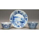 A CHINESE OCTAGONAL BLUE AND WHITE TEA BOWL AND A TEA BOWL AND SAUCER, QING DYNASTY, KANGXI