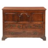 A GEORGE III PINE MULE CHEST, LATE 18TH C  the boarded lid with moulded edge above breakarched or