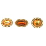 THREE VICTORIAN CITRINE AND PEARL BROOCHES, MID 19TH C  in gold, 256mm and smaller, 14g Good