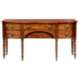 A GEORGE III MAHOGANY SIDEBOARD, C1820 fitted with drawers, apron drawer and cellarette with brass