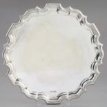 A GEORGE V SILVER SALVER  on three leaf capped volute feet, 36.5cm diam, by Lee & Wigful Ltd,