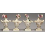 TWO MATCHING MINIATURE PAIRS OF GERMAN ROCOCO PORCELAIN URNS, c1780  applied and painted with