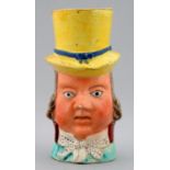 A STAFFORDSHIRE ENAMELLED EARTHENWARE PORTRAIT JUG OF JOHN LISTON AS PAUL PRY, C1820  13cm h Good