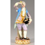A MEISSEN FIGURE OF A BOY WITH FLOWERS, LATE 19TH C 17cm h,   incised C73, crossed swords, red