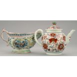 A WORCESTER GLOBULAR TEAPOT AND COVER AND SAUCEBOAT, C1765-80 both with clobbered decoration,