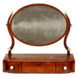 A GEORGE IV MAHOGANY DRESSING MIRROR, C1830  crossbanded in rosewood and line inlaid, the oval frame