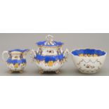 A ROCKINGHAM SUCRIER AND COVER, CREAM JUG AND  SLOP BASIN, C1830-42  of basket weave moulded