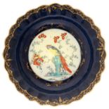 A WORCESTER GROS BLEU GROUND KAKIEMON PLATE, C1770  enamelled with the Sir Joshua Reynolds