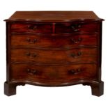 A GEORGE III SERPENTINE MAHOGANY CHEST OF DRAWERS, C1780  with ebony and line inlaid angles,