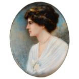 CYRIL H JACKSON (FL EARLY 20TH CENTURY)  A LADY in a white dress and pearl necklace, in profile, sky