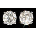 A PAIR OF DIAMOND EAR STUDS   each round brilliant cut diamond of approx 1.5ct each, 8mm, Birmingham