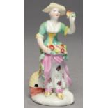 A DERBY FIGURE OF SPRING FROM THE FOUR RUSTIC SEASONS, C1760  in the form of a woman standing before