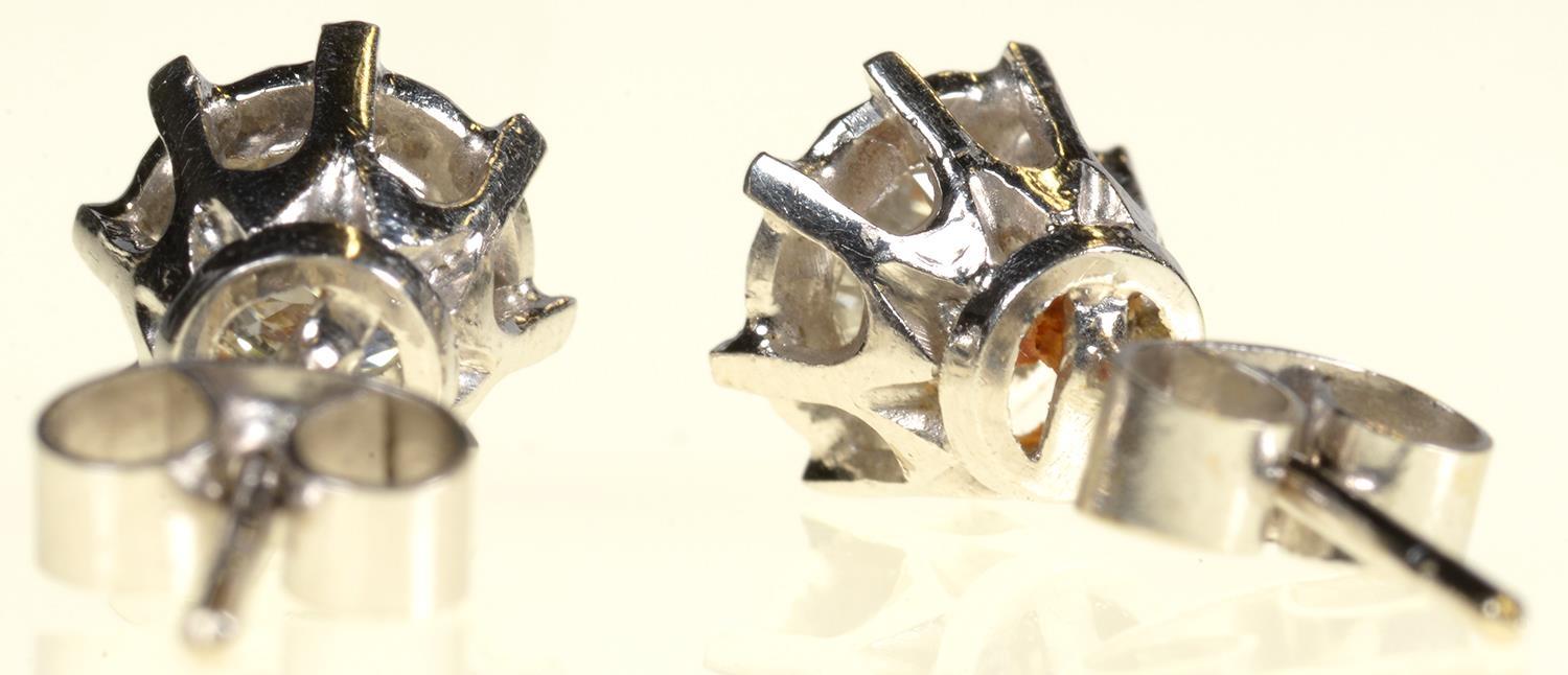 A PAIR OF DIAMOND EAR STUDS  with round brilliant cut diamonds mounted in white gold, 6mm,  2g - Image 3 of 4