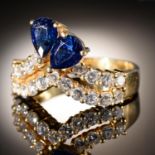A SAPPHIRE AND DIAMOND DART RING  in gold, marked 18k, 6.5g, size N½ Good condition