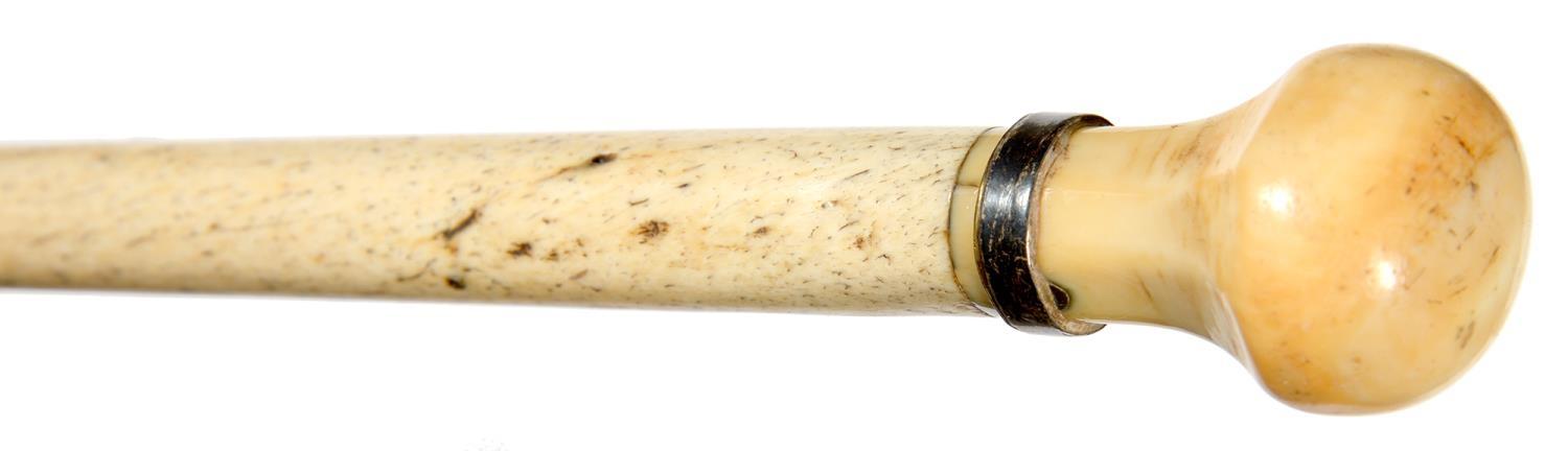 SCRIMSHAW.  A VICTORIAN WHALEBONE AND WHALE IVORY  CANE with bulbous pommel, 87.5cm Cane with - Image 3 of 3