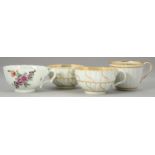 A WORCESTER FLUTED POLYCHROME TEA CUP AND THREE WORCESTER WHITE AND GILT TEA AND  COFFEE CUPS,