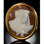 A FINE VICTORIAN CAMEO BROOCH the oval shell carved with the personification of night and emblems of