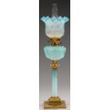 A VICTORIAN BRASS AND SHADED BLUE GLASS COLUMNAR OIL LAMP, LATE 19TH C  enamelled and gilt with