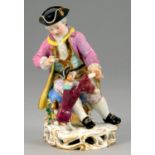 A MEISSEN FIGURE OF A  SEATED BOY WITH A DOG, 19TH C  12cm h, impressed 56, incised B94, crossed