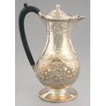 A GEORGE III SILVER LIDDED JUG  later chased and engraved with armorials, 24cm h, maker's mark