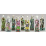 A SET OF EIGHT CHINESE ENAMELLED BISCUIT FIGURES OF IMMORTALS, BAIXIANG AND ANOTHER FIGURE OF