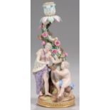 A MEISSEN FIGURAL CANDLESTICK EMBLEMATIC OF SPRING FROM THE FOUR SEASONS, C1870  28cm h, impressed
