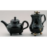 A JACKFIELD WARE THREE FOOTED TEAPOT AND COVER AND JUG AND COVER, C1760  the jug with bird knop
