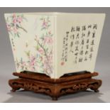 A CHINESE FAMILLE ROSE JARDINIERE, 19TH/20TH C of flared square shape, decorated with birds and