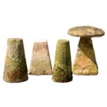 FOUR PYRAMIDAL, ROUND AND OVAL STADDLE STONES AND ONE MUSHROOM, 19TH C  stones 53-63cm h Removed