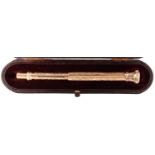 A VICTORIAN GOLD SLEEVED COMBINATION PEN-PENCIL, C1870  foliate engraved and set with shield