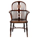 A  YEW WOOD WINDSOR ARMCHAIR, THAMES VALLEY AND CHILTERNS, C1820-40   with fretted fruitwood wheel