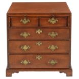 A GEORGE III MAHOGANY CHEST OF DRAWERS, C1780   with caddy moulded top, oak brushing slide and
