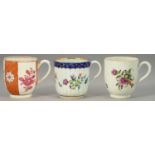 THREE WORCESTER POLYCHROME COFFEE CUPS, C1770-80  two painted with flowers one beneath a blue