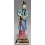 A CHINESE EXPORT PORCELAIN FAMILLE ROSE NODDING FIGURE OF A LADY, EARLY 19TH C  in blue and pink