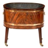 AN OVAL BRASS BOUND MAHOGANY WINE COOLER, C1900  in George III style with brass carrying handles,