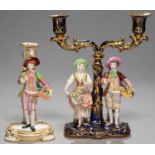 TWO MINTON SINGLE AND DOUBLE FIGURE CANDLESTICKS, C1835 in the form of fruit and flower sellers, the