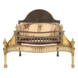 A NEO CLASSICAL SERPENTINE STYLE PIERCED BRASS AND BURNISHED STEEL BASKET FIRE GRATE  with urn