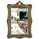 A 19TH C STYLE GILTWOOD AND COMPOSITION MIRROR WITH BEVELLED PLATE, SURMOUNTED BY A SEVRES  STYLE