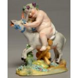 A CONTINENTAL PORCELAIN FIGURE OF THE DRUNKEN SILENUS ON AN ASS, MID 19TH C, 19CM H, UNDERGLAZE BLUE